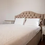Flag Suites +12